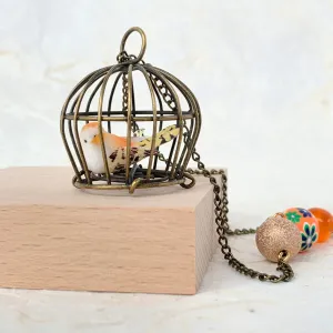 Little Bird In A Vintage Birdcage Pendant Necklace in Begonia