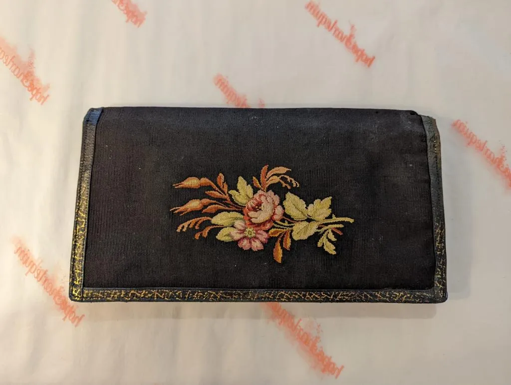Tapestry-style vintage black clutch bag
