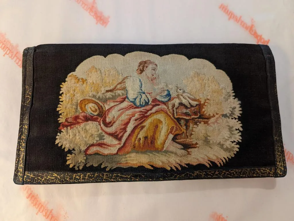 Tapestry-style vintage black clutch bag