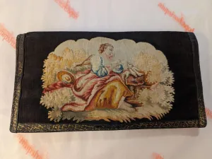 Tapestry-style vintage black clutch bag