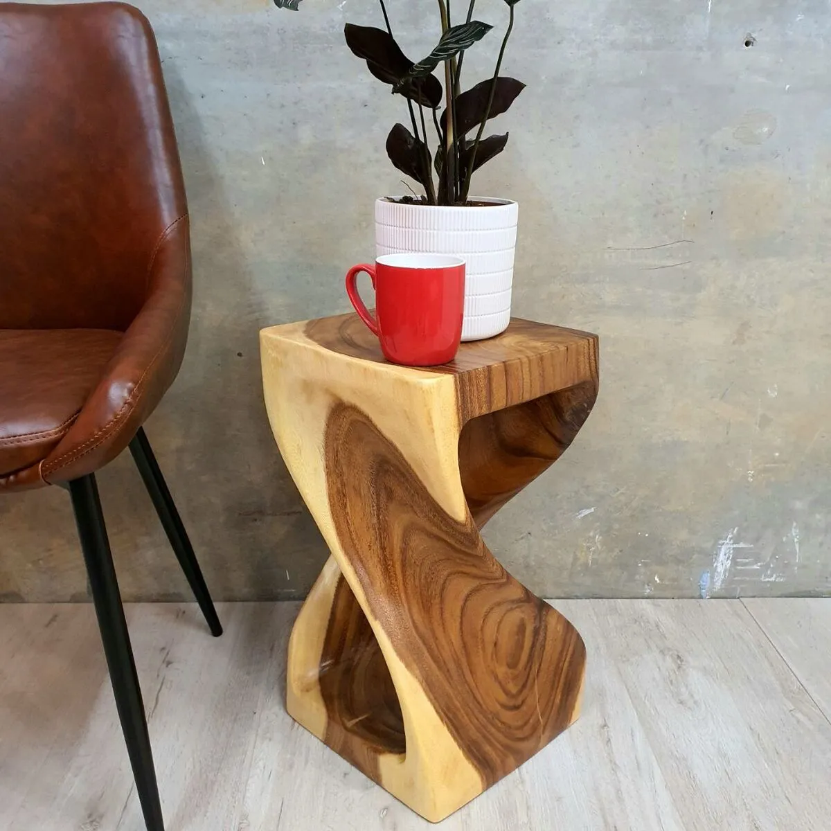 The twist-Raintree Wood Stool/Corner side Table/Lamp Table Carved out of a Whole Tree Trunk.