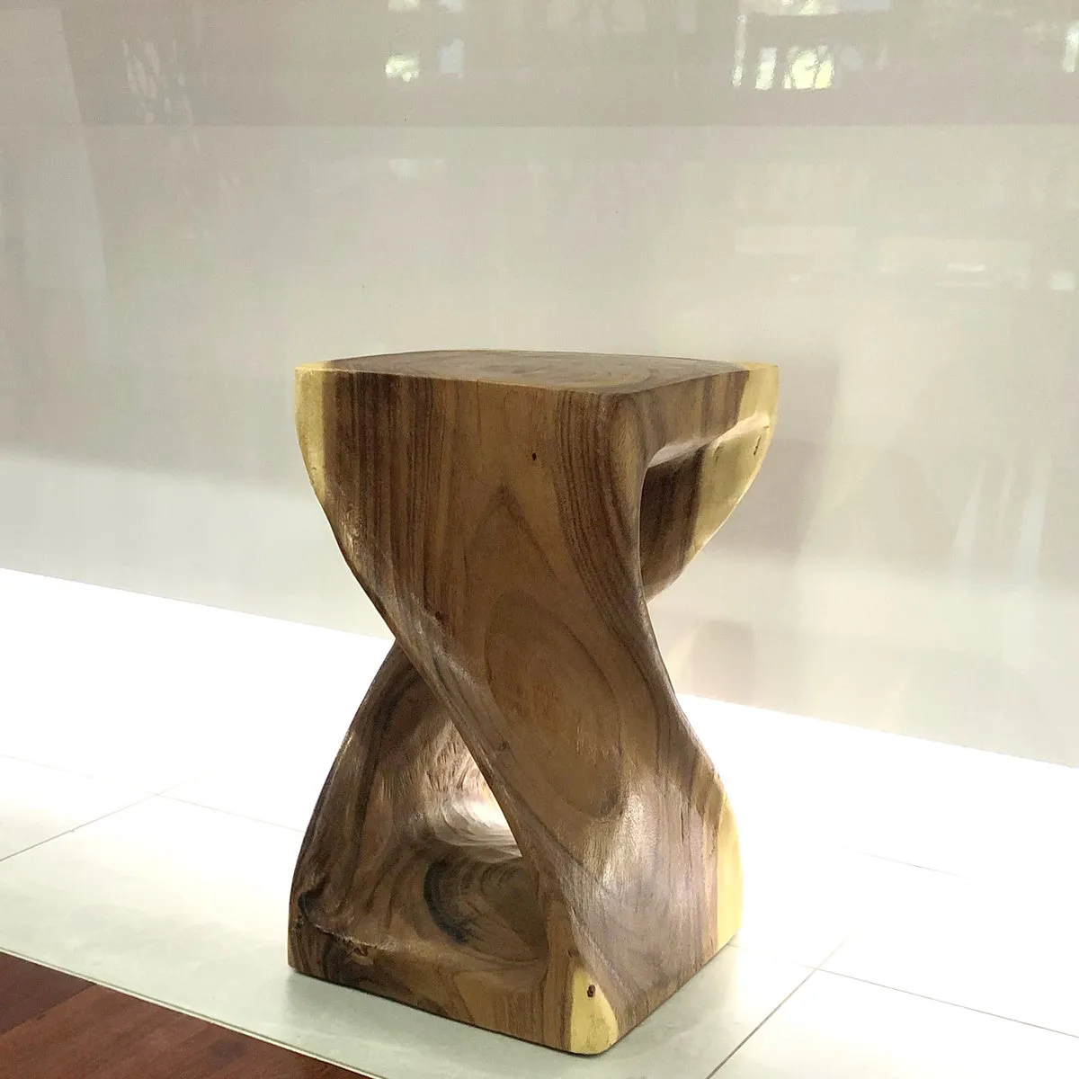 The twist-Raintree Wood Stool/Corner side Table/Lamp Table Carved out of a Whole Tree Trunk.